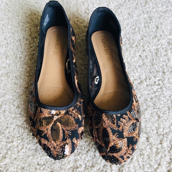 black and gold flat shoes